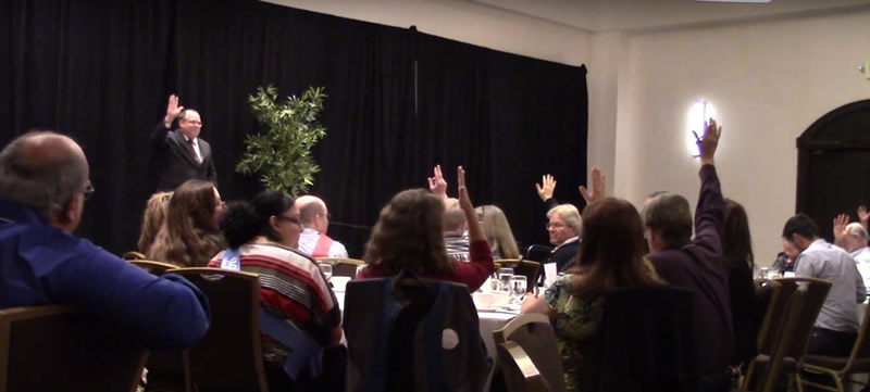 Marty Dickinson presenting at district conference for Toastmasters